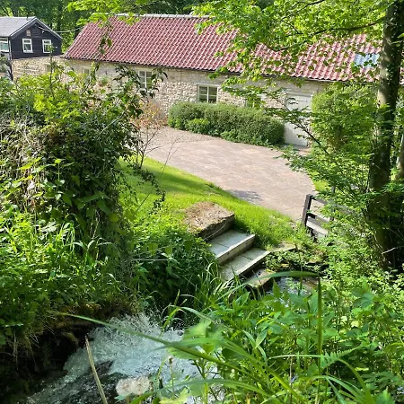 Mill With Waterfall In North Yorkshire
